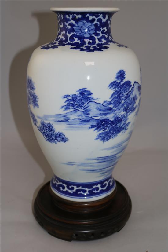 A Chinese porcelain blue and white baluster vase, 13.25in.